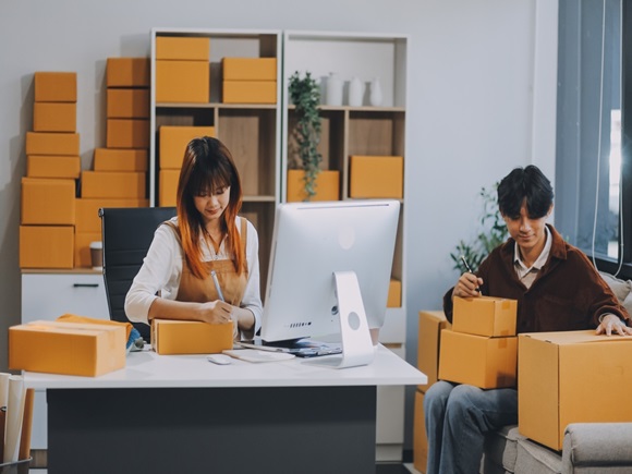 Small business owners couple entrepreneurs working with parcel, e-business, marketing, online shop, sme, entrepreneurs _id2507685217