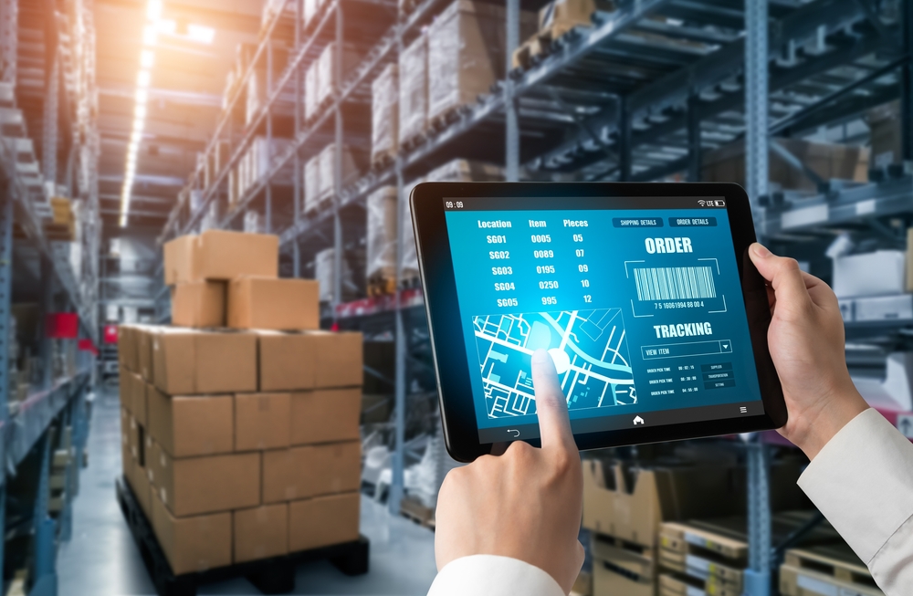 Warehouse worker tracking orders using an order and warehouse management system (WMS)