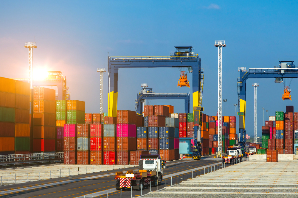 Industrial logistics and transportation of truck in Container yard for logistic and Cargo business plane.-image_1350792032