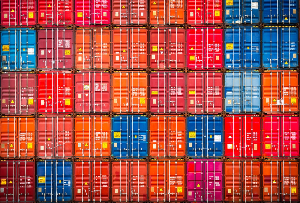 Row of Stacked Colorfull Containers Cargo Shipping. Cargo Container ships, Freight Trucks Import-Export Business. Distribution Warehouse. Handling of Logistic Transportation Industry._id2290967477