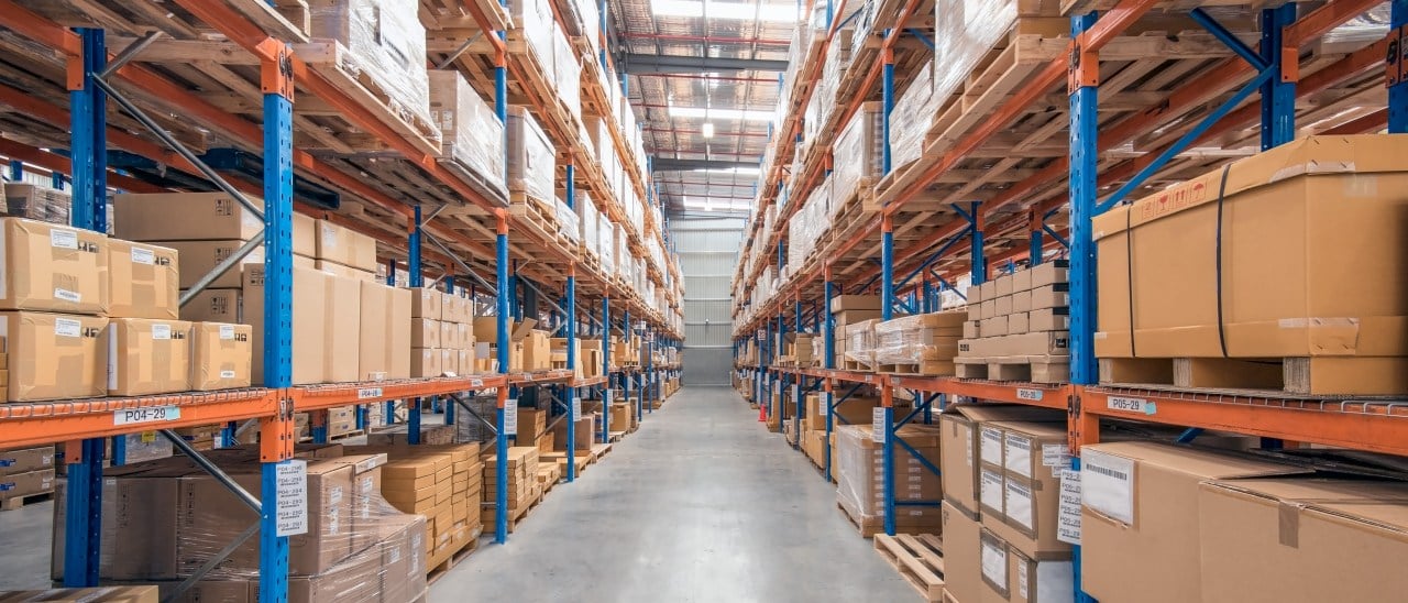 warehouse with racks of inventory, showing the importance of inventory balancing