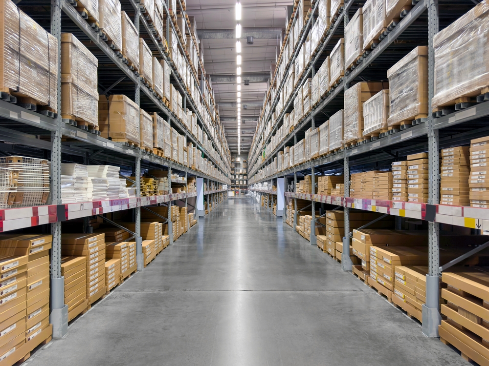 Look down the aisle of a warehouse or fulfillment center.