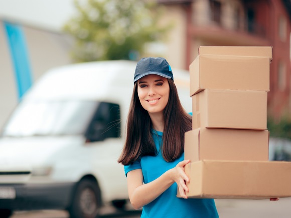 Distribution Service Delivery Worker Holding Many Cardboard Packages. Employee holding and handling parcel boxes_id1154770684