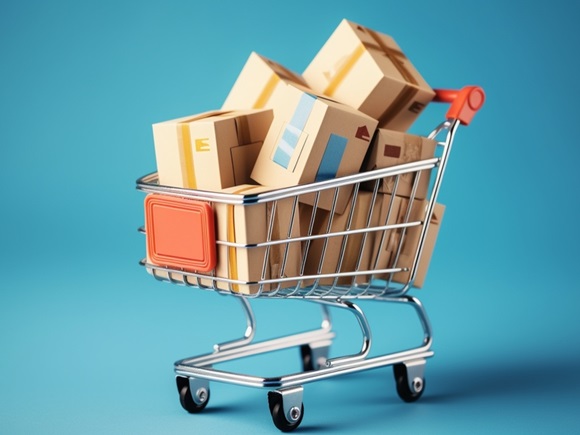 A shopping cart full of boxes on a blue background_id2309087499