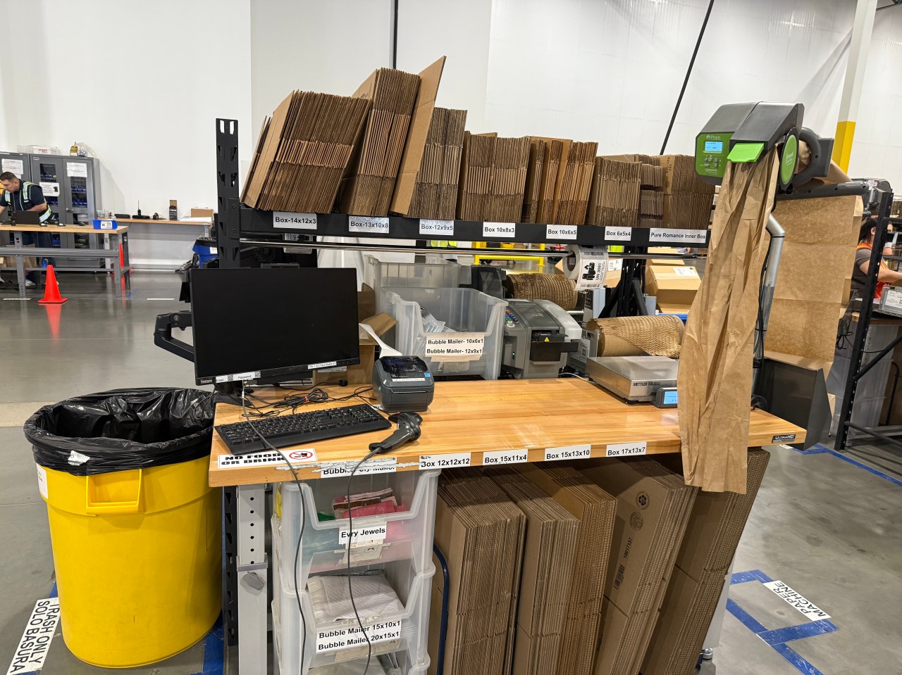 Behind the scenes of a ShipBob packing station, where orders are packed and prepared for shipment