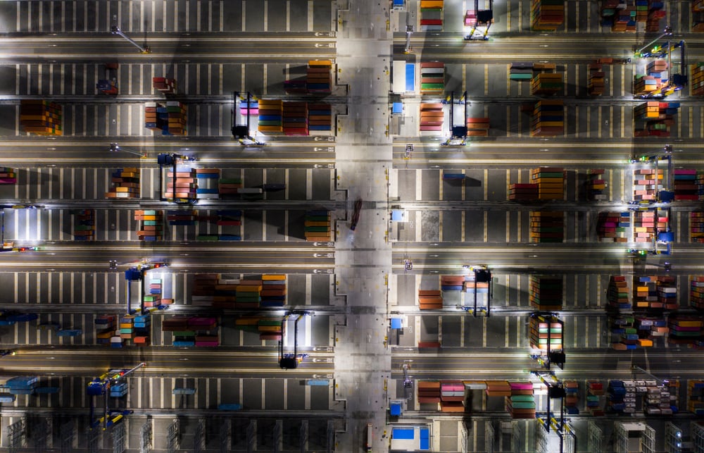 Aerial top view. Container ship in pier with crane bridge carries out export and import business in the open sea at twilight. Logistics and transportation_id1452977291