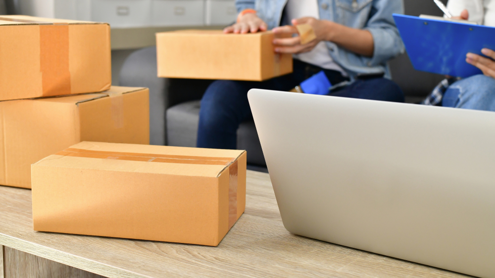 Sme business concept. Young Asian people are packing their packages.Delivery business Small and Medium Enterprise (SMEs). Young man is working in the house.Young Owner Start up for Business Online._id1149802673