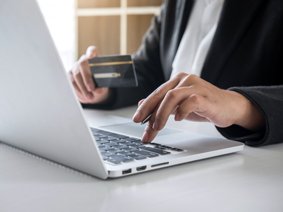 Business woman consumer holding credit card and typing on laptop for online shopping and payment make a purchase on the Internet, Online payment, networking and buy product technology_id1472441699