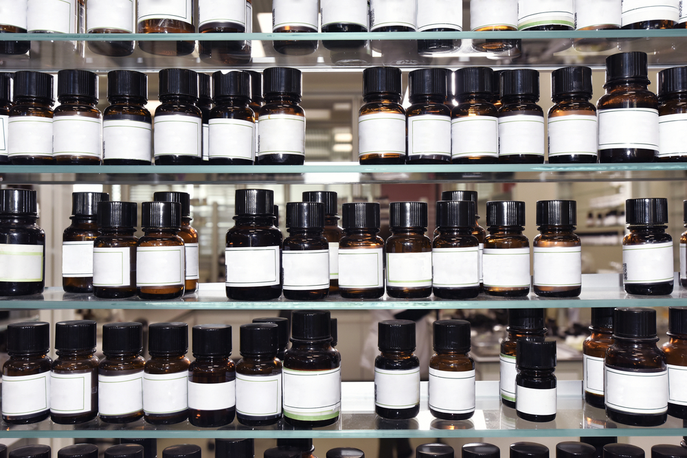 Close up amber color bottles in laboratory_id541759567