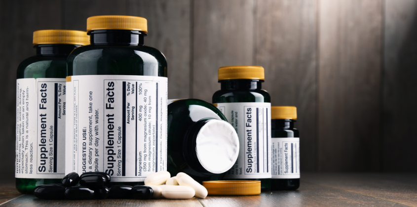 Composition with dietary supplement containers. Drug pills_id730019806